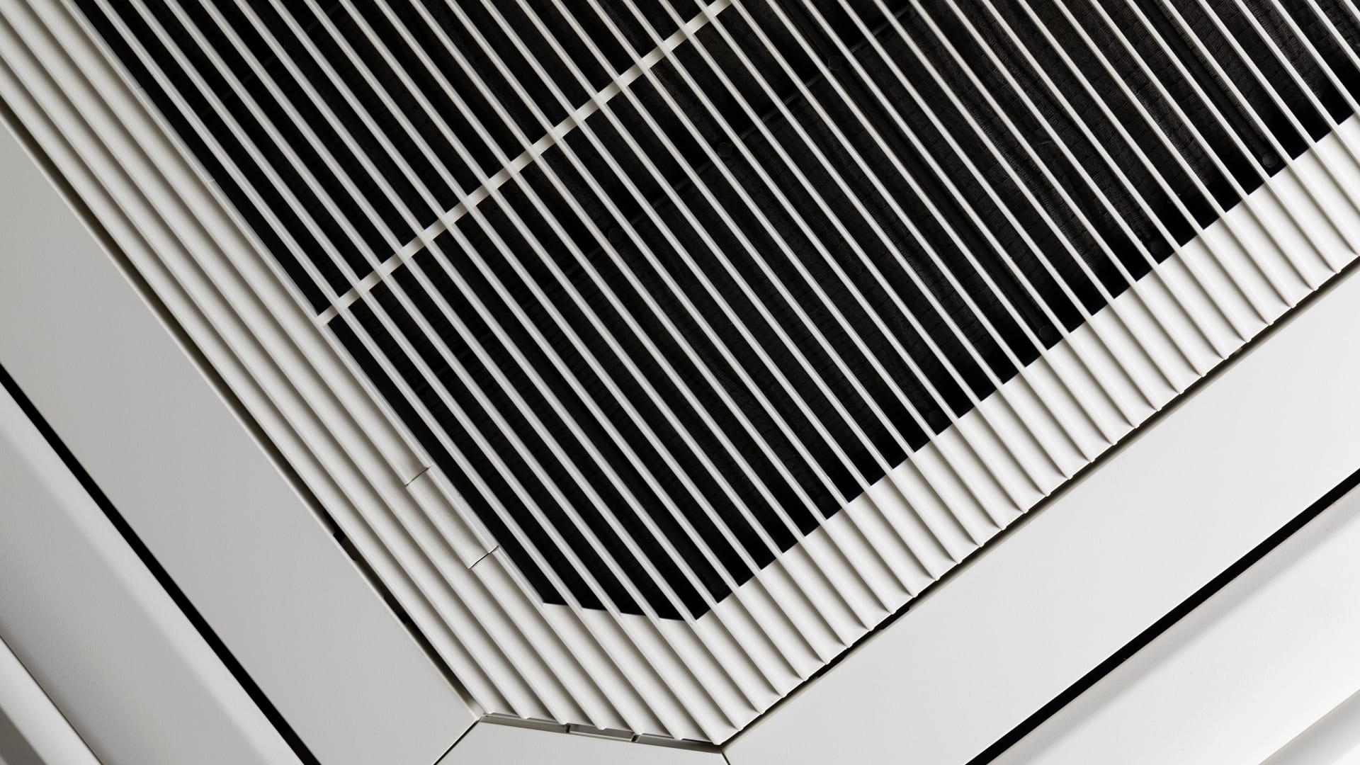 Professional technician cleaning commercial dryer vent