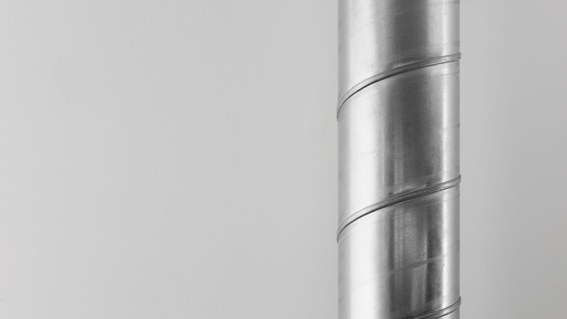 Professional technician installing commercial electrostatic filter