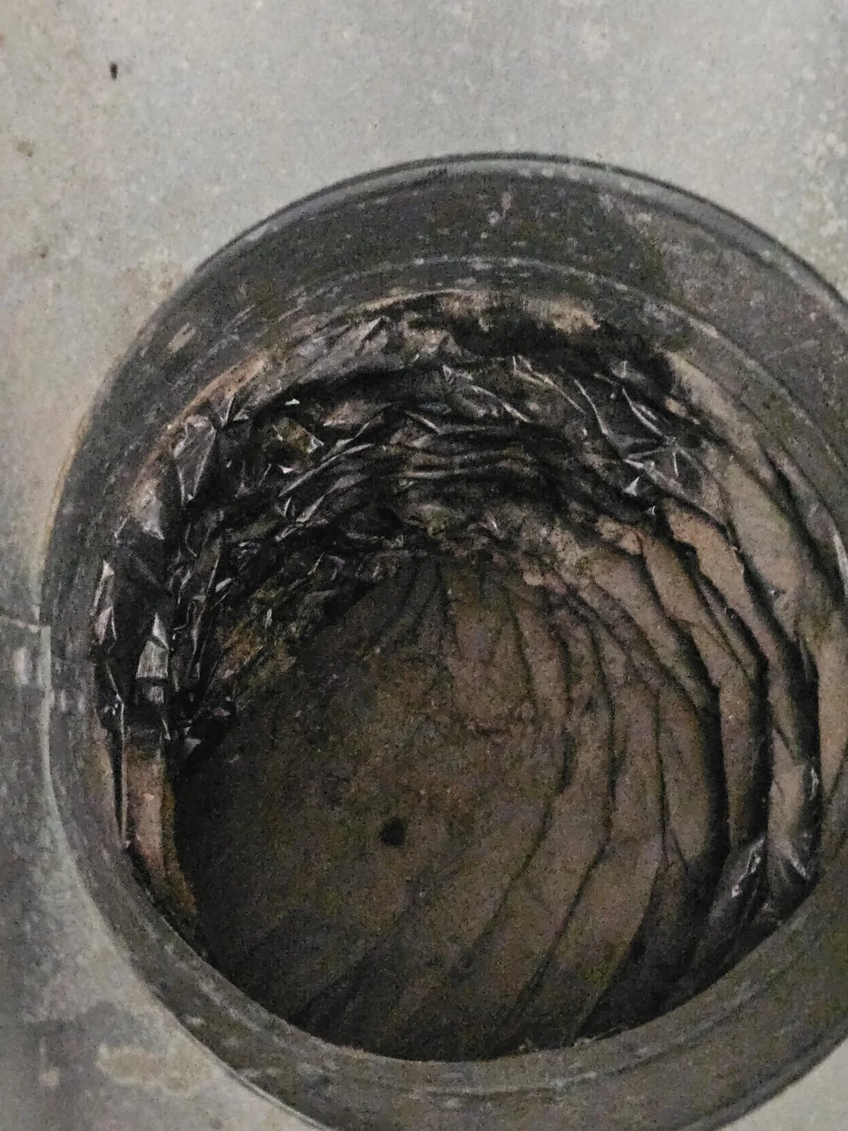 PAC project photo looking inside flexible ductwork