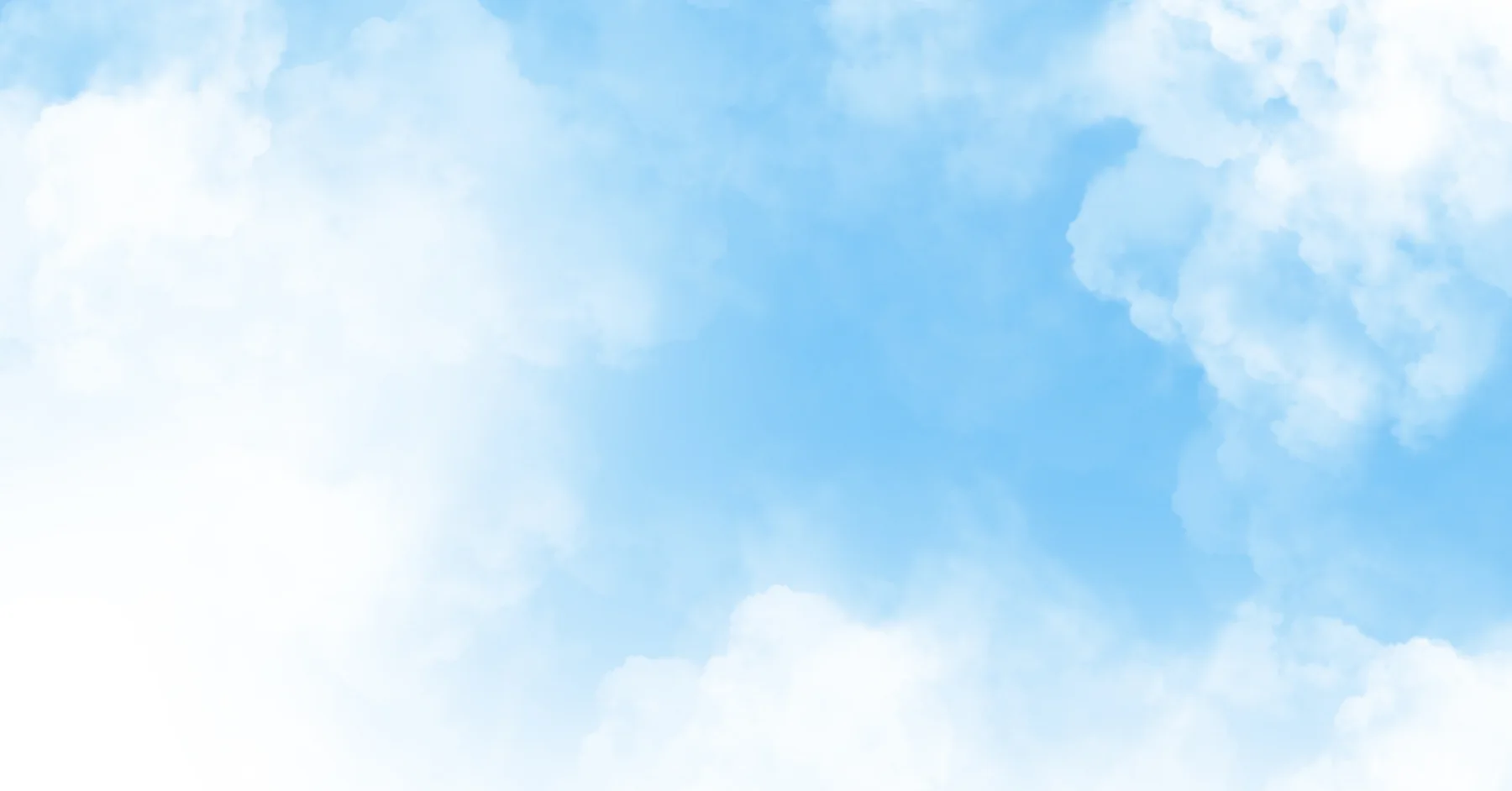 Sunlight and clouds in a clear blue sky